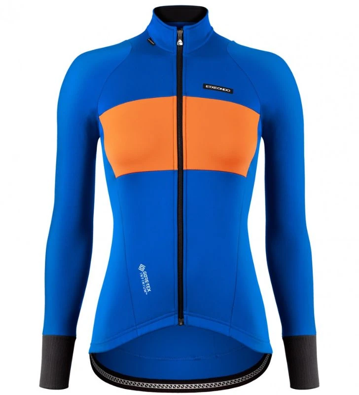 ETXEONDO Casaco Lurra Gore-Tex Windstopper Mulher azul / laranja